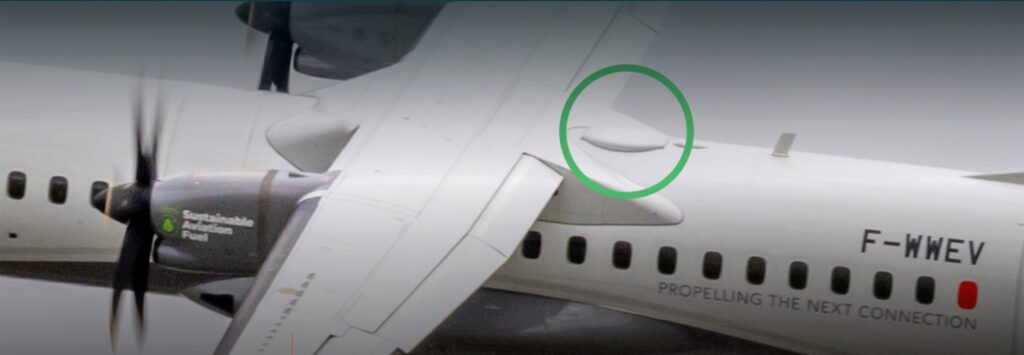Starlink phased array antenna atop an ATR 72-600 turboprop. The antenna terminal's placement aft of the straight wing is circled in green.